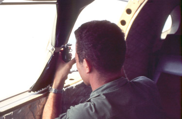 Maintenance Officer taking photos out the window. Photo by CPT Bob Dodge Maintenance Officer taking photos out the window. Photo by CPT Bob Dodge